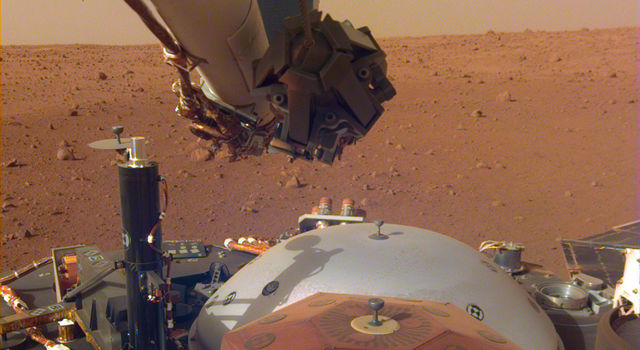 This image from InSight's robotic-arm mounted Instrument Deployment Camera This image from InSight's robotic-arm mounted Instrument Deployment Camera